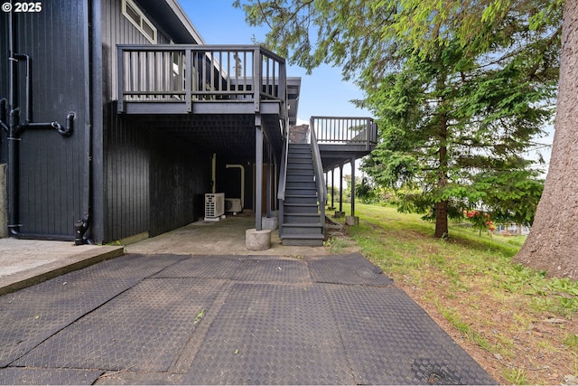 404 Chinook Ave, Astoria, OR 97103 - view of property exterior with a wooden deck and stairway