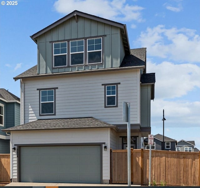 3430 SE 83rd Ave, Hillsboro, OR 97123 - view of front of property featuring roof with shingles, an attached garage, board and batten siding, and concrete driveway