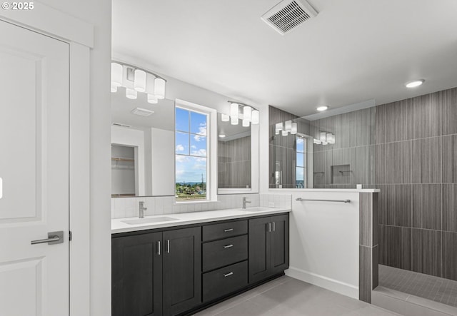 3430 SE 83rd Ave, Hillsboro, OR 97123 - full bath with a walk in shower, double vanity, tile patterned flooring, and tasteful backsplash