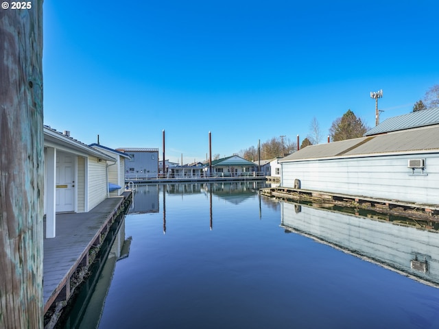 dock area with a water view