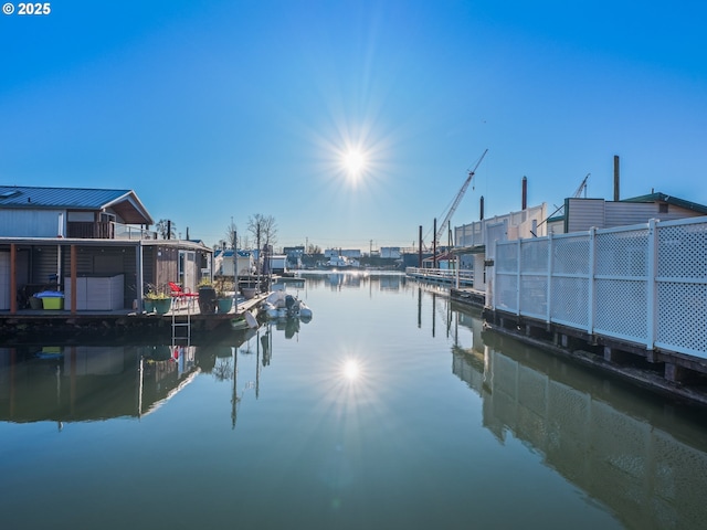 view of dock with a water view