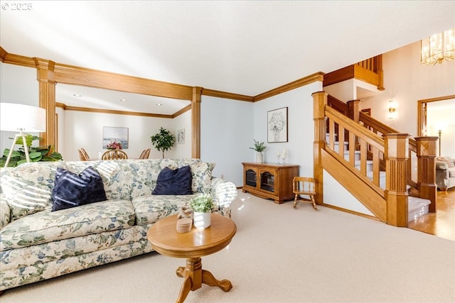 living room featuring crown molding and carpet