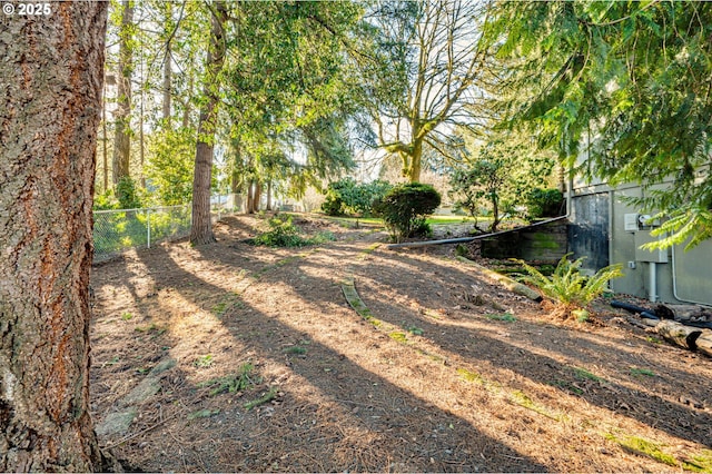 view of yard featuring fence