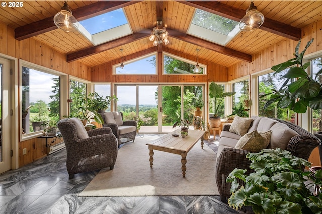 sunroom / solarium featuring a skylight, wooden walls, healthy amount of natural light, wood ceiling, and baseboard heating