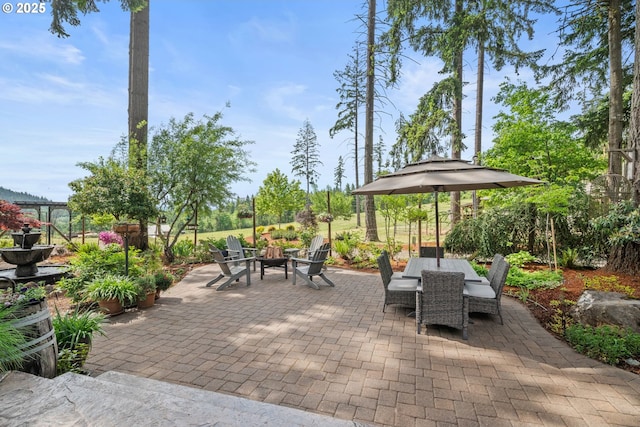 view of patio featuring outdoor dining space
