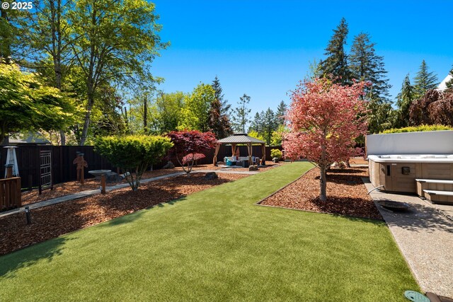 3985 SW 102nd Ave, Beaverton, OR 97005 - view of yard featuring a gazebo, a hot tub, and a patio