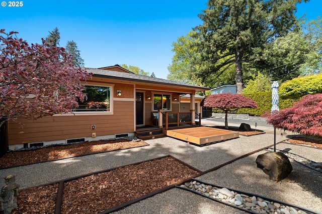 doorway to property with a deck