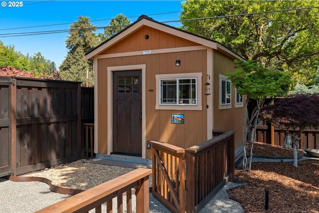 view of outbuilding with an outbuilding and a fenced backyard