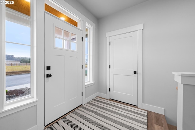 foyer entrance with baseboards