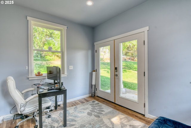 office area with recessed lighting, french doors, baseboards, and wood finished floors