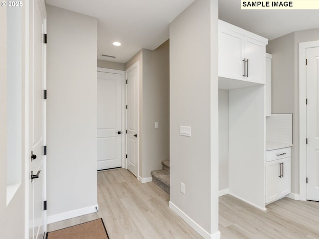 732 NW 178th Way, Ridgefield, WA 98642 - hall with light wood-style flooring, recessed lighting, baseboards, and stairs