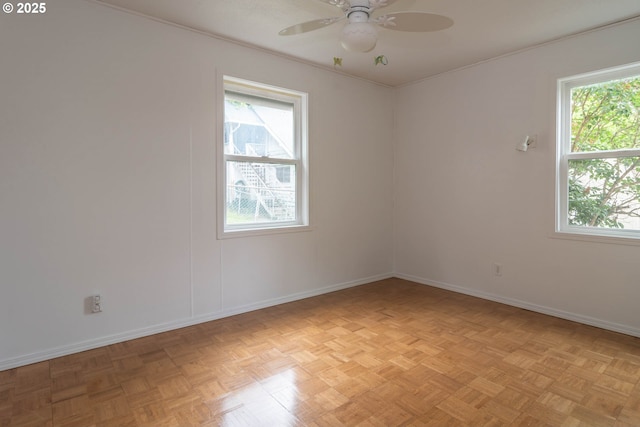 731 NE Casper St, Roseburg, OR 97470 - empty room featuring healthy amount of natural light, a ceiling fan, and baseboards