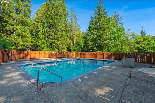 65257 E Sandy River Ln, Rhododendron, OR 97049 - view of swimming pool featuring a patio and a fenced backyard