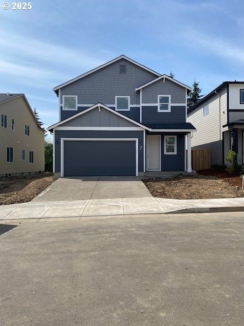 1747 N Millican Creek St, Lafayette, OR 97127 - view of front of property with driveway and a garage