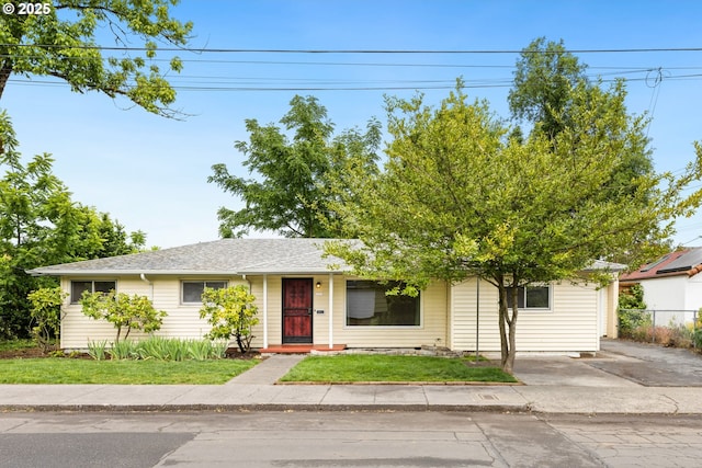 6631 SE Mitchell Ct, Portland, OR 97206 - view of front of home featuring roof with shingles and driveway