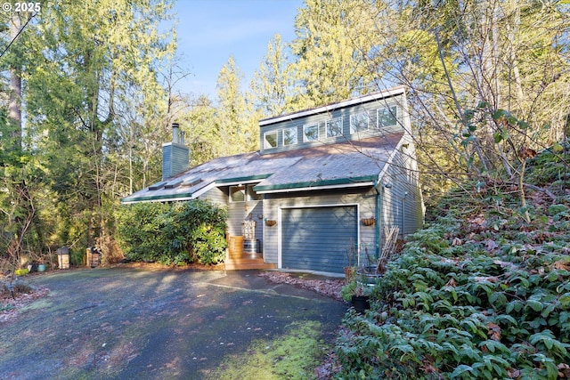 view of front of home with a garage