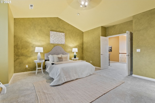 carpeted bedroom featuring lofted ceiling, visible vents, ceiling fan, and baseboards