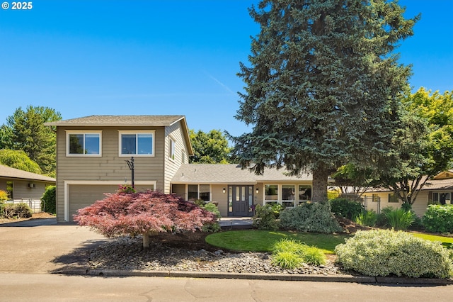 1615 Kingwood St, Forest Grove, OR 97116 - view of front facade with asphalt driveway and a garage