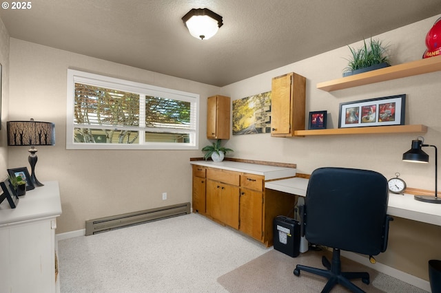 1615 Kingwood St, Forest Grove, OR 97116 - office space featuring a baseboard radiator, a textured ceiling, and baseboards