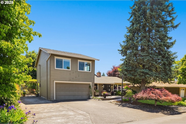 1615 Kingwood St, Forest Grove, OR 97116 - traditional home with an attached garage and driveway