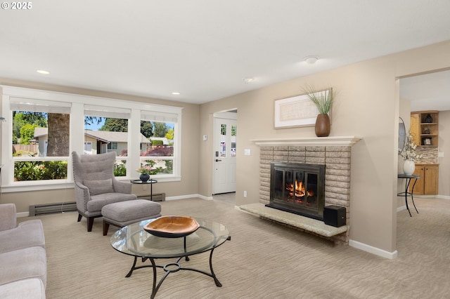 1615 Kingwood St, Forest Grove, OR 97116 - carpeted living area with a baseboard heating unit, baseboards, a fireplace, and recessed lighting