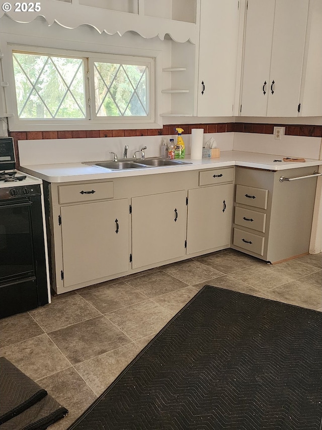 544 Lou Gray Dr, Myrtle Creek, OR 97457 - kitchen featuring electric range, light countertops, white cabinets, and open shelves
