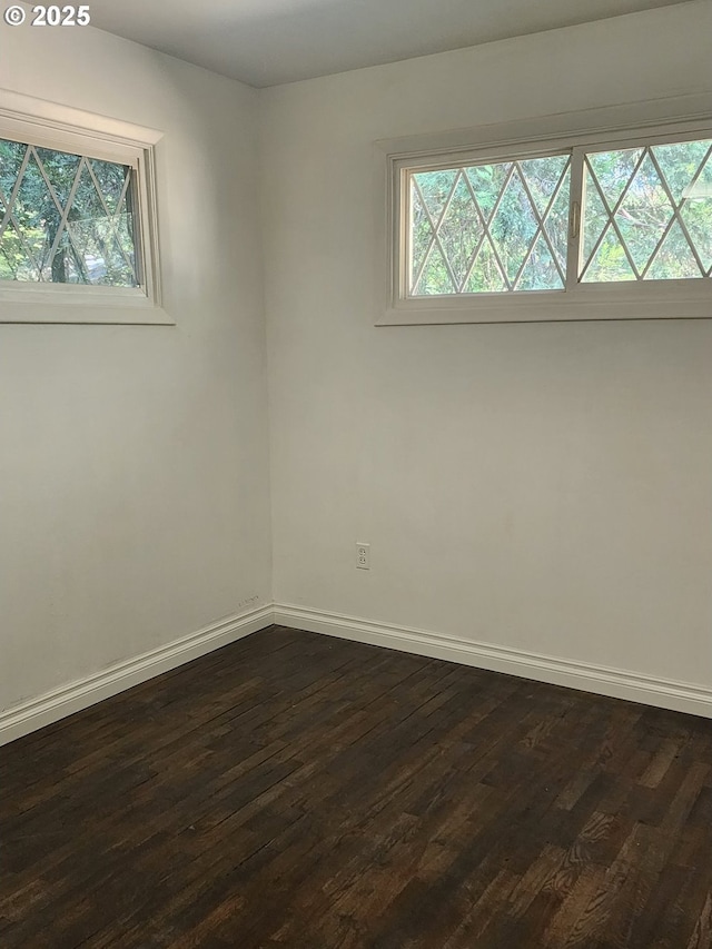 544 Lou Gray Dr, Myrtle Creek, OR 97457 - unfurnished room featuring dark wood-style flooring and baseboards
