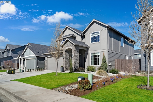 view of front facade with a garage and a front yard