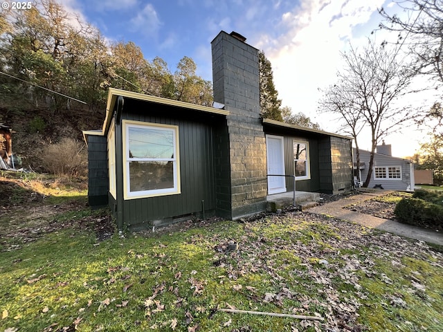 exterior space featuring a chimney