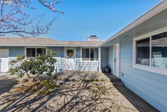 546 W Fir Ave, Coos Bay, OR 97420 - entrance to property with a chimney