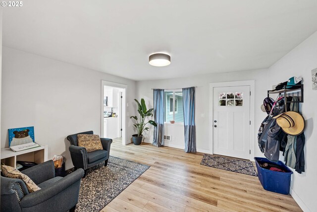 546 W Fir Ave, Coos Bay, OR 97420 - foyer featuring wood finished floors and visible vents