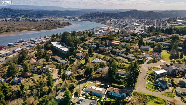 546 W Fir Ave, Coos Bay, OR 97420 - birds eye view of property featuring a water view