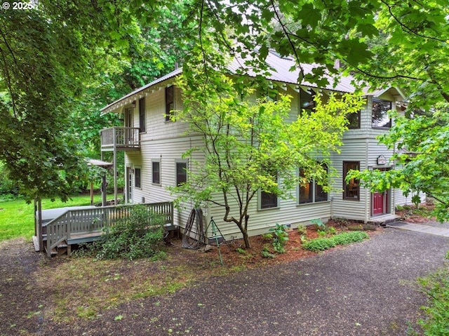 4932 Baseline Dr, Mount Hood Prkdl, OR 97041 - view of front of house with a balcony and a wooden deck