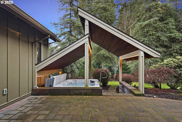 view of patio with a hot tub