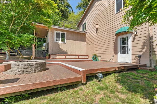 579 S Schooner Creek Rd, Lincoln City, OR 97367 - wooden terrace featuring an outdoor fire pit