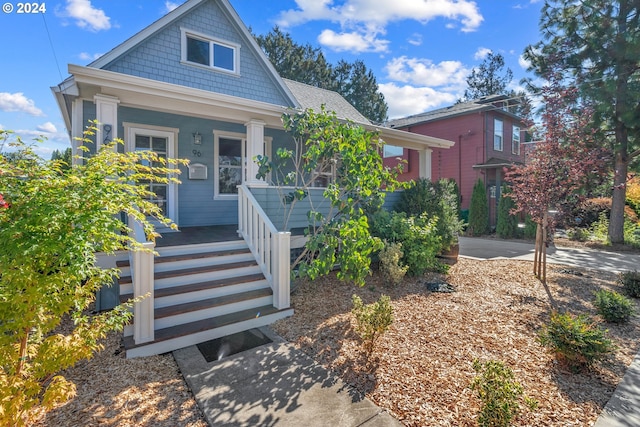 view of front of property featuring covered porch