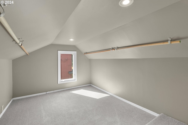 bonus room with recessed lighting, baseboards, carpet flooring, and vaulted ceiling