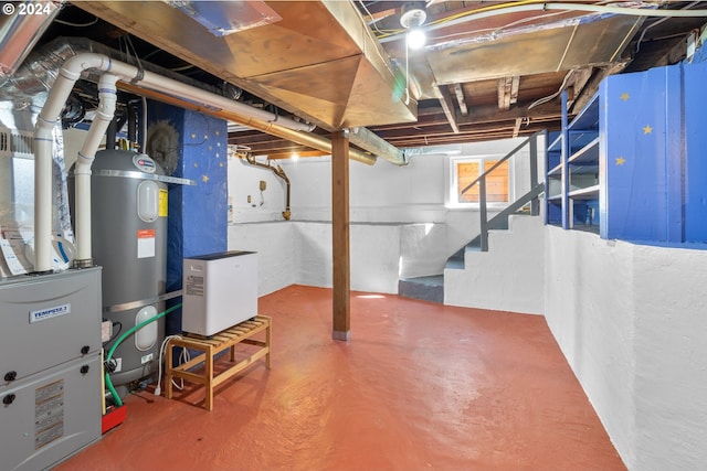 basement with secured water heater and stairs