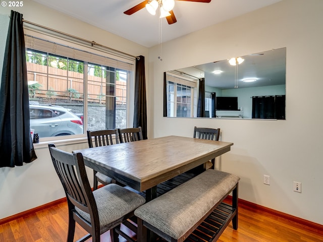 10800 SE 17th Cir Unit M141, Vancouver, WA 98664 - dining area with a ceiling fan, wood finished floors, and baseboards