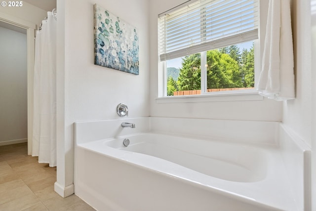 202 Edgewater Dr, Carson, WA 98610 - bathroom featuring a bath and tile patterned flooring