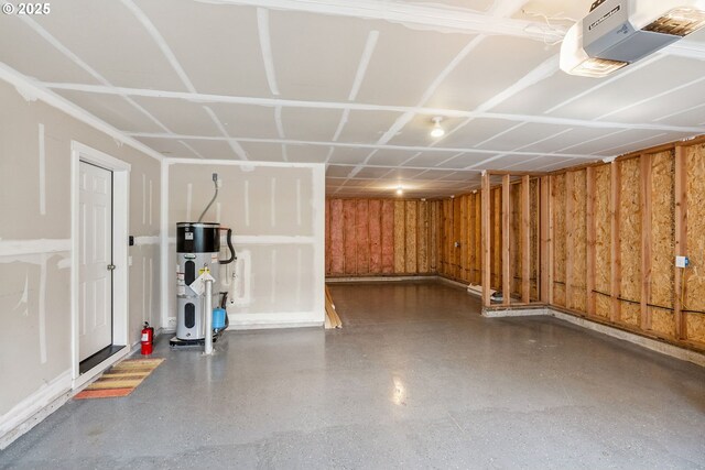 202 Edgewater Dr, Carson, WA 98610 - garage featuring water heater and a garage door opener
