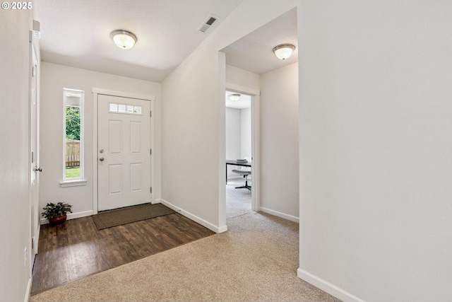 202 Edgewater Dr, Carson, WA 98610 - carpeted entryway with baseboards and wood finished floors