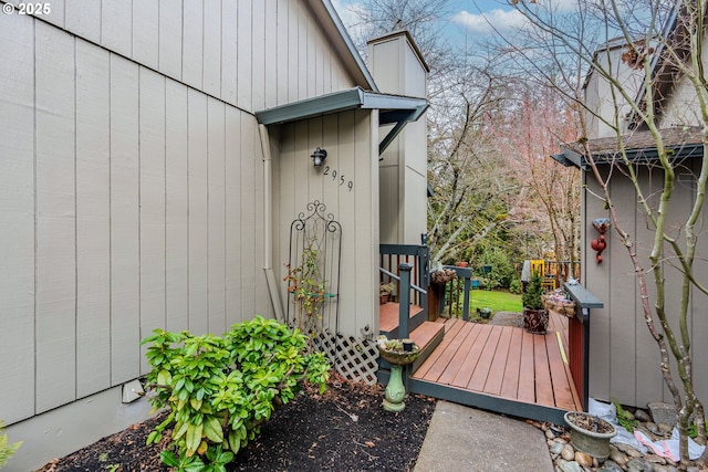 entrance to property with a wooden deck