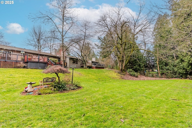 view of yard featuring a deck