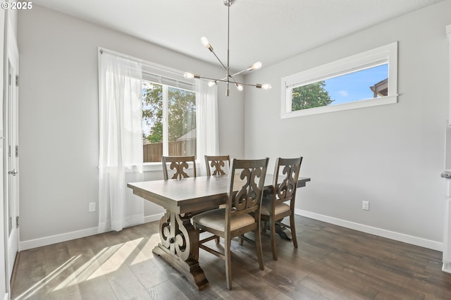 142 N 35th Pl, Cornelius, OR 97124 - dining room featuring wood finished floors, a chandelier, and baseboards
