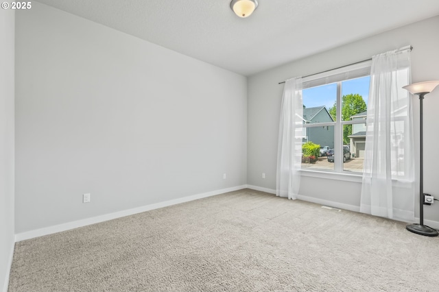 142 N 35th Pl, Cornelius, OR 97124 - spare room featuring carpet and baseboards