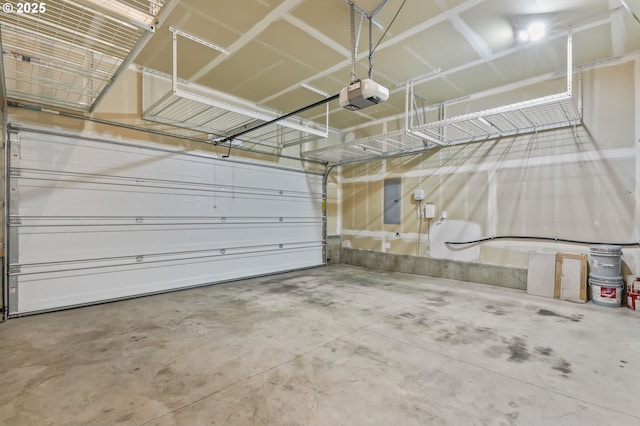 142 N 35th Pl, Cornelius, OR 97124 - garage featuring a garage door opener and electric panel