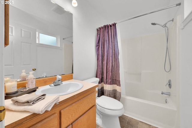 bathroom with shower / tub combo, toilet, and vanity