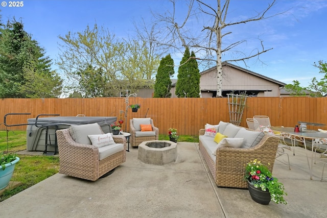 view of patio / terrace featuring an outdoor living space with a fire pit and a fenced backyard