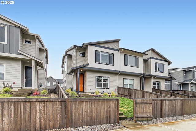 view of front of property with a fenced front yard